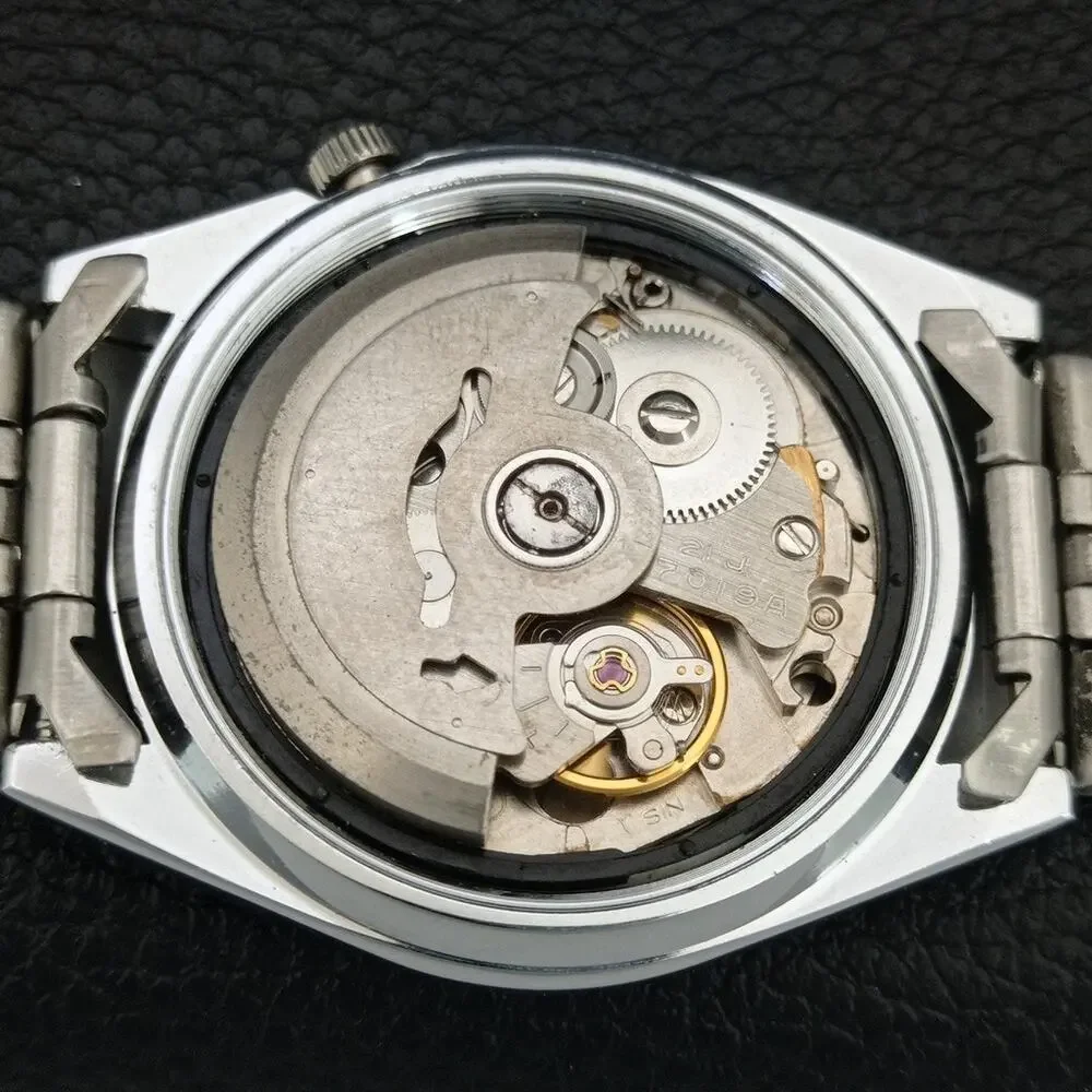Vintage 1976 Seiko Automatic Mens Silver Watch W/daydate & White accents